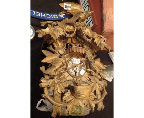 Black Forest large cuckoo clock complete with pine cone weights