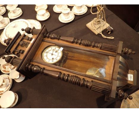 Victorian mahogany wall clock with key  CONDITION REPORT: This item was working at lotting up 
