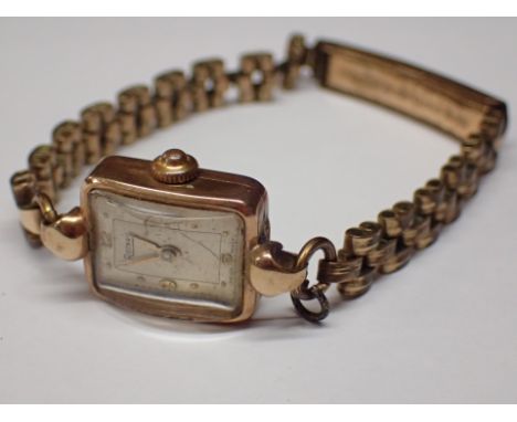 Ladies 9ct gold Rotary wristwatch on a plated bracelet
