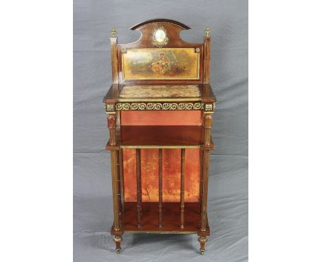 A LATE 19TH CENTURY MAHOGANY CANTERBURY, the raised back with oval porcelain miniature above an oil painting of a courting co