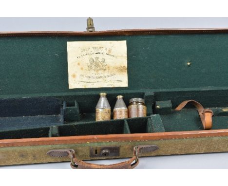 A CANVAS RIFLE CASE COMPLETE WITH TRADE LABEL FOR JOHN RIGBY & CO, 43 Sackville Street, Nos London, Rigby opened this address