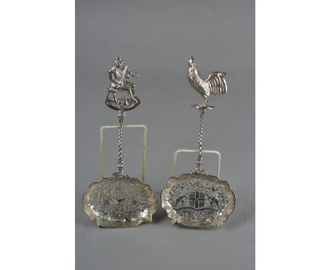 TWO LATE 19TH CENTURY CONTINENTAL SILVER DECORATIVE SPOONS, both with pierced and chased bowls with heraldic crests, spiral t