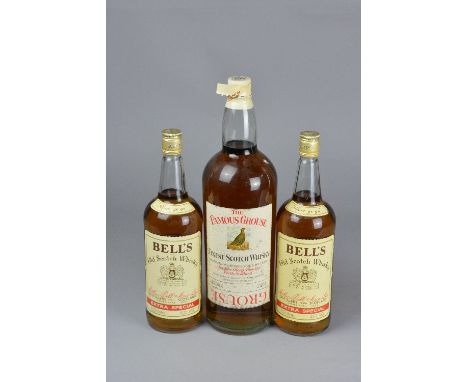 THREE BOTTLES OF BLENDED SCOTCH WHISKY, 1 x The Famous Grouse, 40% vol, 2.25L, fill level lower neck, seal partially broken b