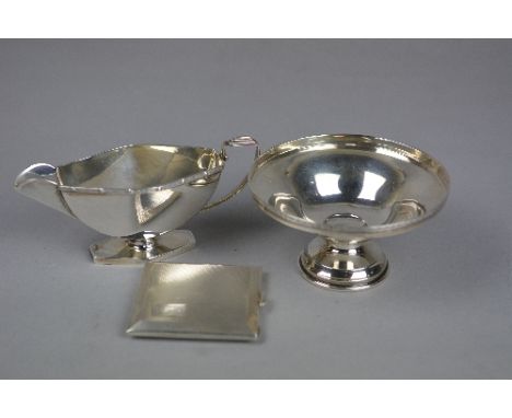 A GEORGE VI SILVER SAUCE BOAT, of lozenge form, cast Celtic design rim, on an angular foot, maker Ernest W. Haywood, Birmingh