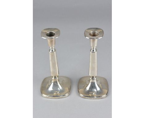 A PAIR OF MID 20TH CENTURY SWEDISH SILVER CANDLESTICKS, circa 1964, marked K &amp; EC, loaded bases, heights approximately 17