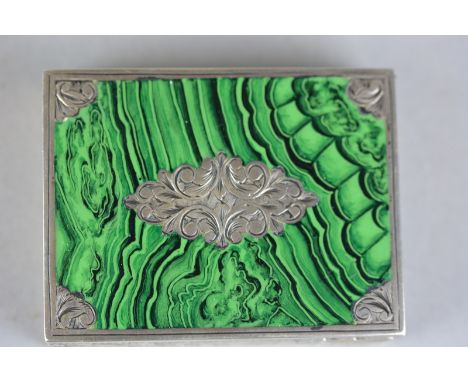 A 20TH CENTURY CONTINENTAL WHITE METAL AND ENAMEL COMPACT, of rectangular outline, malachite effect enamel, engraved decorati