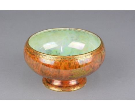 A WEDGWOOD BUTTERFLY LUSTRE PEDESTAL BOWL, pattern number Z4830, single butterfly to the interior, the exterior with a band o