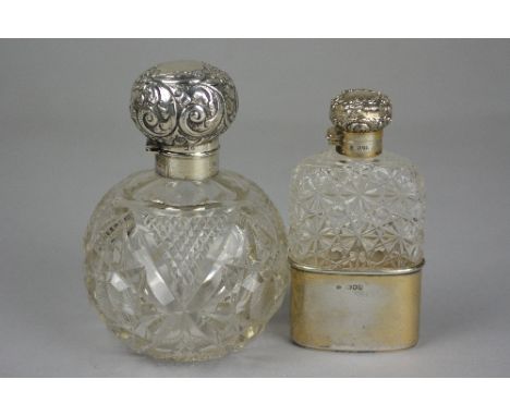 A LATE VICTORIAN SILVER MOUNTED CUT GLASS HIP FLASK, maker C.D., London 1900, height approximately 13cm, together with an Edw