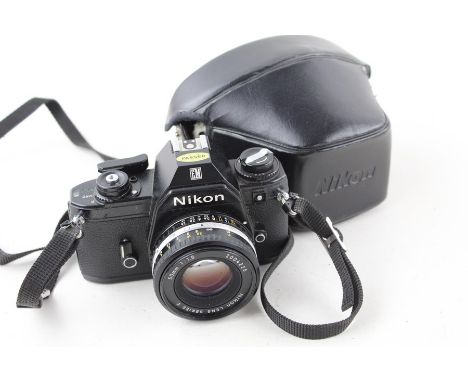 Nikon EM 35mm SLR FILM CAMERA w/ 50mm F/1.8 Lens 