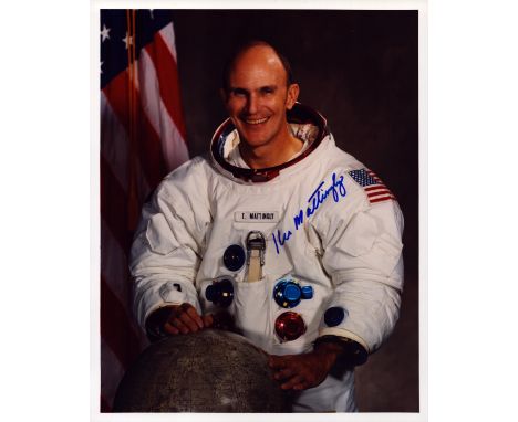 Thomas K. Mattingly, II signed 10x8 inch colour photo pictured in space suit. Good condition. All autographs are genuine hand