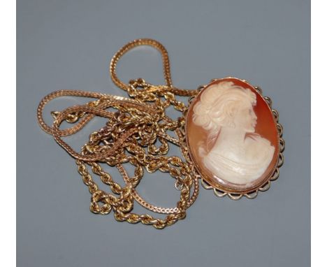 A modern 9ct. gold framed carved cameo portrait brooch, a 9ct. gold multi-twist necklace and one other 9ct. gold necklace.