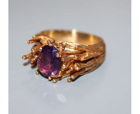 A 1970's modernist 9ct gold and amethyst ring, size N/O.