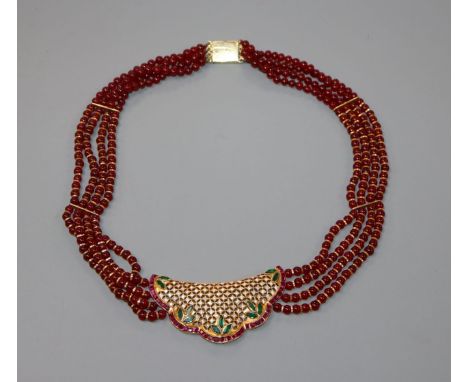 A modern Indian? yellow metal, ruby coloured glass bead, gem and diamond set necklace, 44cm.