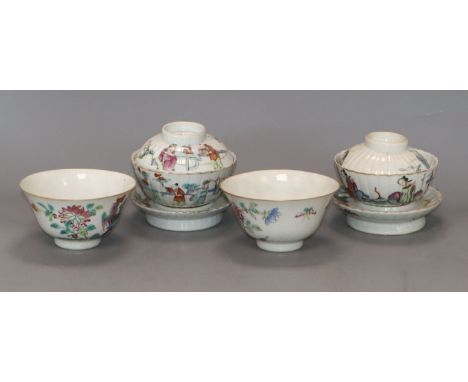 A pair of 20th century Chinese porcelain small bowls, decorated in polychrome with phoenix, and two bowls with covers and sta