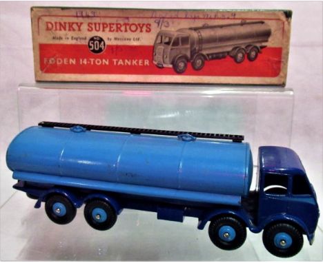 A boxed Dinky Supertoys Foden 14 tonne tanker no. 504, in a dark and light blue livery. Condition Report: Overall condition g