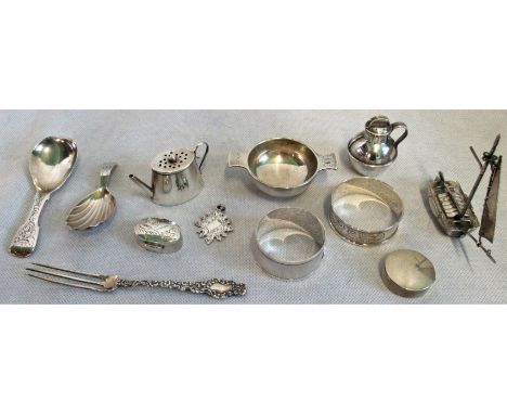Twelve items of miscellaneous silver, to include: caddy spoon, pill box, teapot, boat, napkin ring and other similar items, v