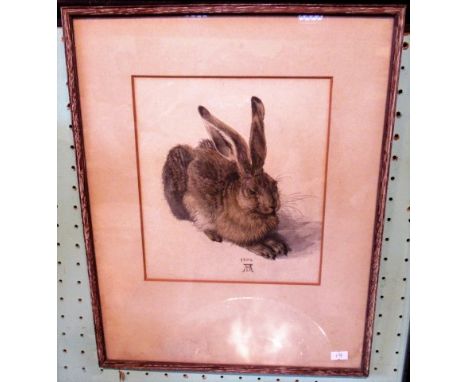 A 20th century framed and glazed print of a recumbent hare, bearing the monogram AD1502, 21 x 24cm.