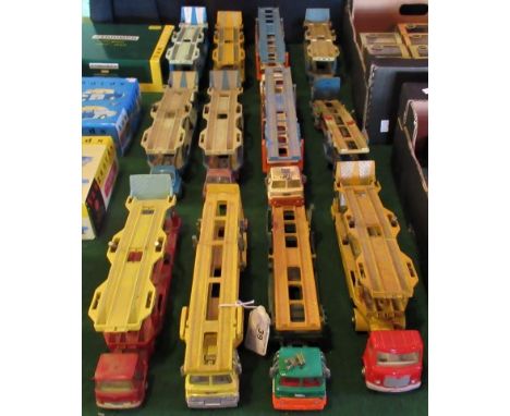 A collection of twelve play worn Corgi car transporters, consisting of mainly Bedford tractor units.