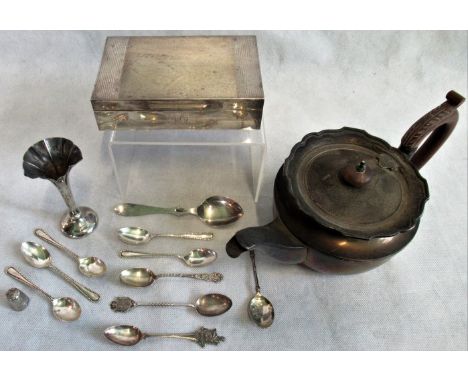 A silver teapot, circular with fluted border, Birmingham 1929, a silver cigarette box by Mappin &amp; Webb and a small quanti