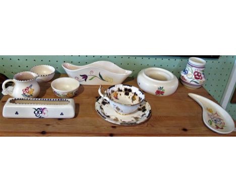 A Rockingham cup &amp; saucer, together with eight pieces of Poole pottery.