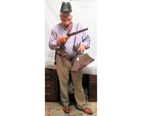 A bicorn naval hat in its original metal carrying case, together with a late 18th/early 19th century pistol, leather shoulder