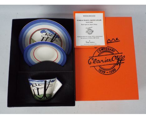 Clarice Cliff - A limited edition Wedgwood Clarice Cliff Centenary Edition conical teacup, saucer and plate decorated in the 
