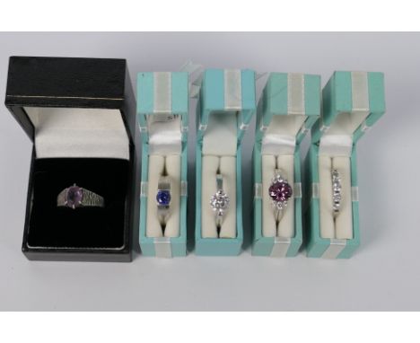 Five white metal, stone set rings, sizes R to U, each stamped 925 or Silver, each contained in presentation box.