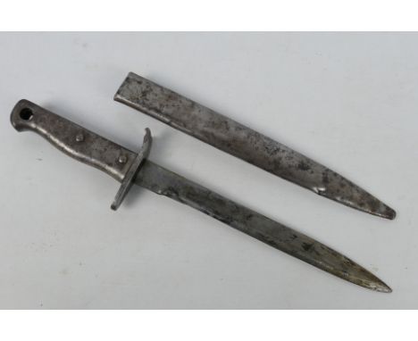 A German Ersatz bayonet, 24 cm single edged blade, steel hilt and crossguard stamped 36575, with steel scabbard, 36 cm overal