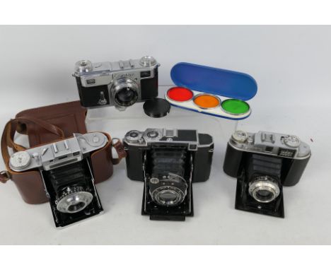 Photography - A collection of cameras to include a Zeiss Ikon Contax II with Carl Zeiss Jena Sonnar 1:2 50mm lens, a Super Ik