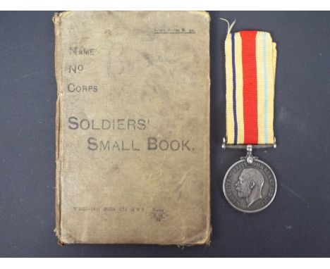 A World War One (WW1 / WWI) British War Medal with associated Africa Star ribbon, named to 29184 PTE G W BAILEY R W FUS along