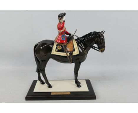 Coalport - Large ceramic figure group of Queen Elizabeth II taking the salute at Trooping the Colour. A limited edition model
