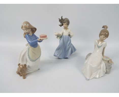 Three Nao figures of young girls with animals, largest approximately 19 cm (h). [3]