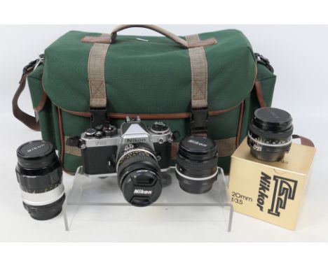 Photography - A Proline camera bag containing a  Nikon FE2 camera with fitted Micro-Nikkor 1:2.8 55mm lens with additional le