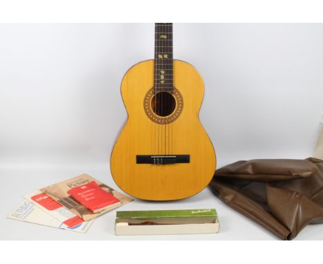 BM Espana - Acoustic Guitar. A full size 4/4 18 fret Spanish Classical guitar in natural wood finish and with original case p