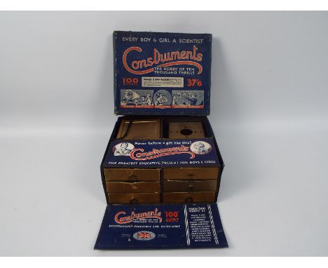 A vintage Construments Outfit 100 scientific construction set for making magnifiers, magic lanterns, cameras, kaleidoscopes, 
