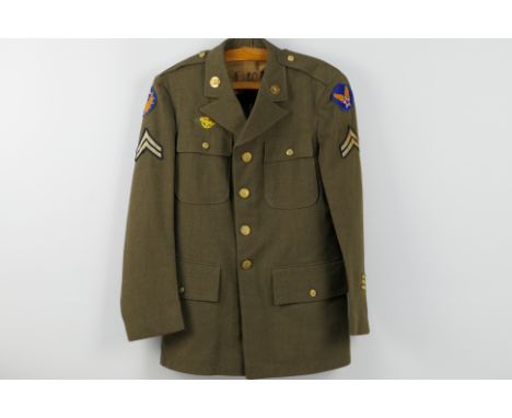 A US Army tunic bearing insignia for Army Air Corps 20th Air Force tunic.