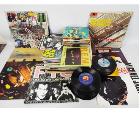 A collection of 7" and 12" vinyl records to include The Beatles, The Doors, ELO, Michael Jackson, The Cure, Fine Young Cannib