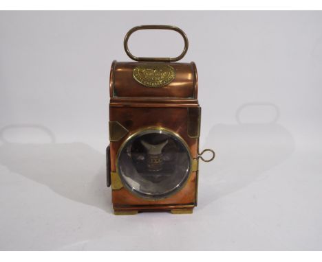 A Merryweather &amp; Sons, London, copper and brass lamp / lantern, marked Fire Engine Makers to the brass plaque, approximat