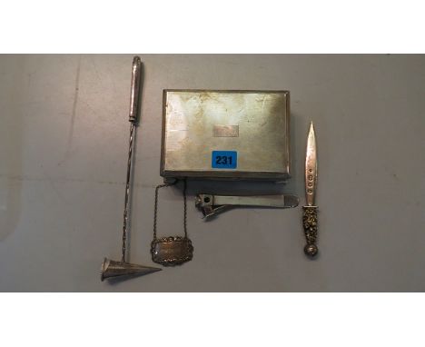 A silver cigarette box with a silver cigar cutter, silver whisky decanter label, silver letter opener, and a silver plated ca