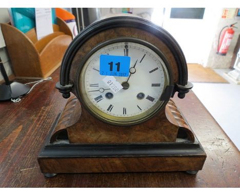 A 19th century walnut and ebonized drum head mantle clock, eight day striking movement with count wheel strike, key and pendu