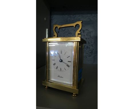 Fosters brass cased carriage clock, five windows and white enamel Roman dial