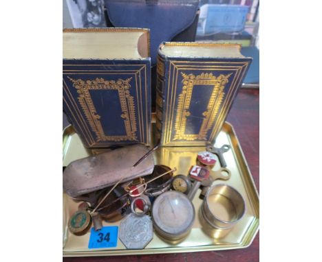 A late 19th century Holy Bible and Common Prayer Book, gilded and cased; vintage clock keys, enamelled badges and medals to i