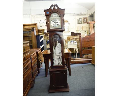 A modern mahogany cased granddaughter clock with a visible pendulum on a plinth with a Roman dial, 51 high