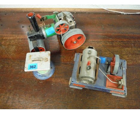 A Mamod model steam traction engine, a Wilesco steam engine and a model circular saw