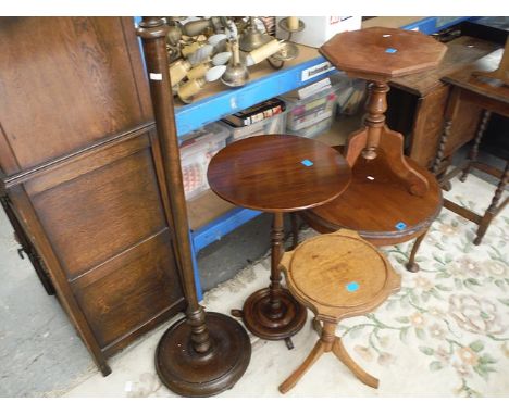 Small early 20th century furniture comprising three pedestal wine tables, a mahogany occasional table and a standard lamp