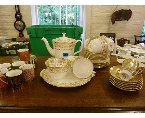 A Minton Jubilee pattern tea set, a Minton Brocade set of six coffee cups and saucers, and a set of six Minton porcelain Bull