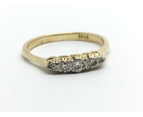 An 18ct gold five stone diamond ring, approx 2.7g and approx size O-P.