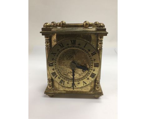 A brass cased Smiths electric carriage clock.