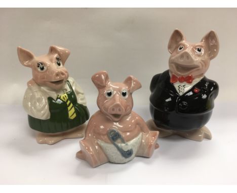 Three Wade Natwest pig figures.