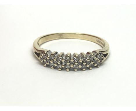 A 9ct gold diamond ring set with three rows of diamonds, approx 1.7g and approx size I- J.